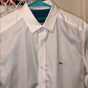 Lacoste small plain white shirt.
